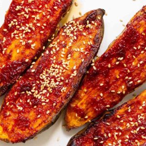 gochujang sweet potatoes on a plate