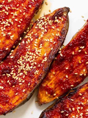 gochujang sweet potatoes on a plate