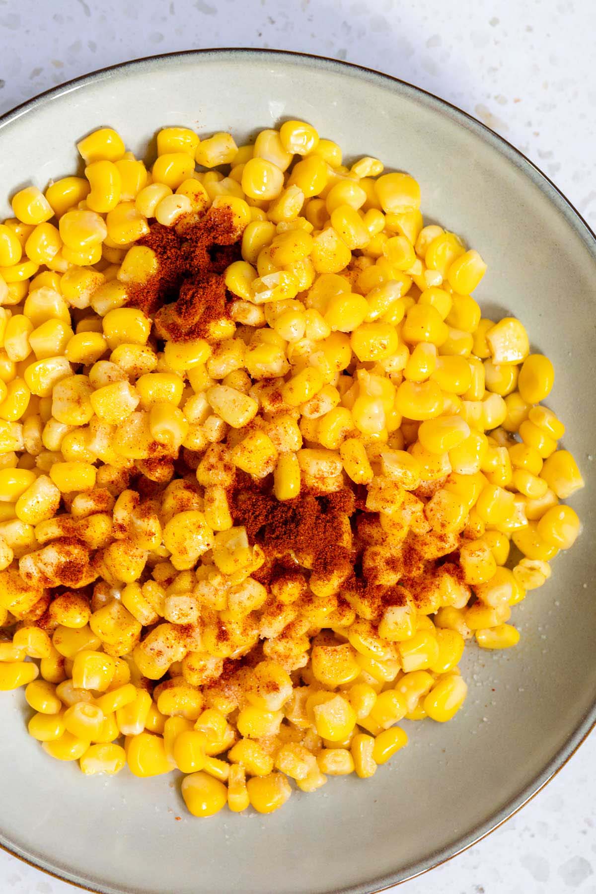 Canned corn with seasonings