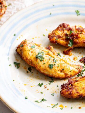 Air fryer chicken tenders on a plate
