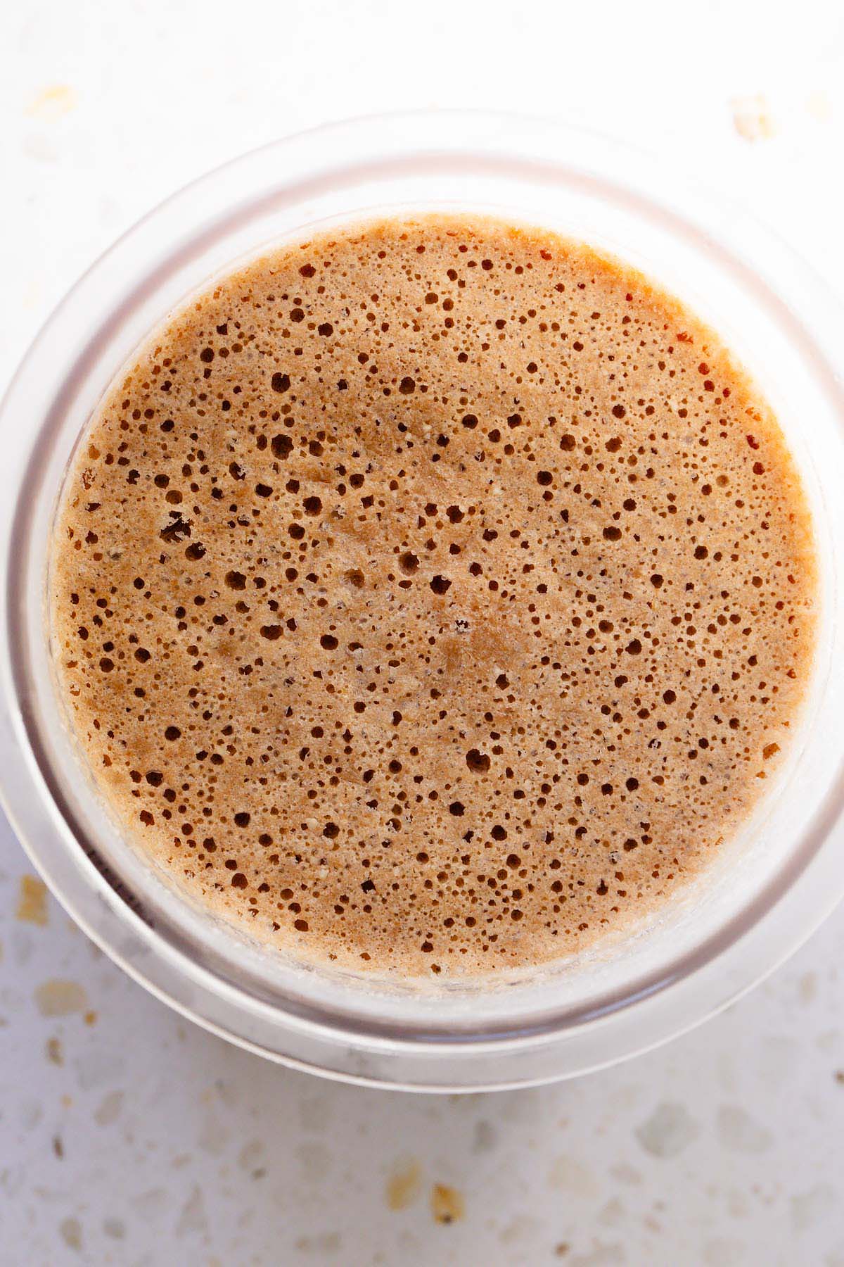 Frozen ice cream in Ninja Creami container