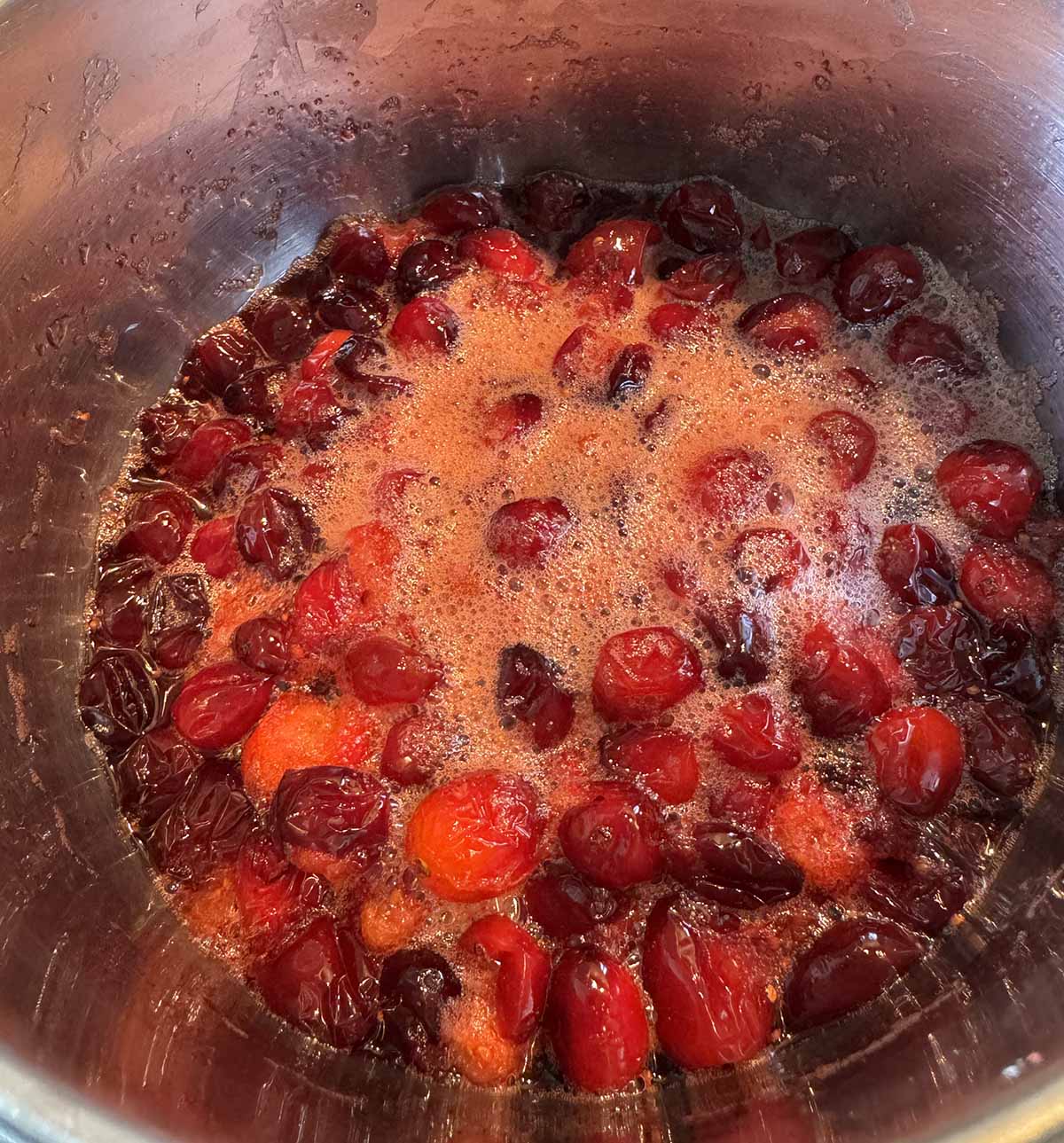 cooking cranberries in a pot