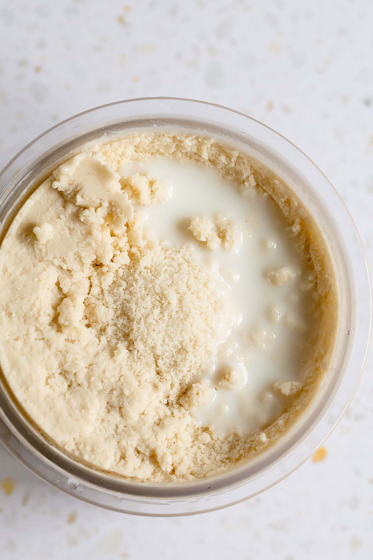 Adding milk to Ninja Creami ice cream