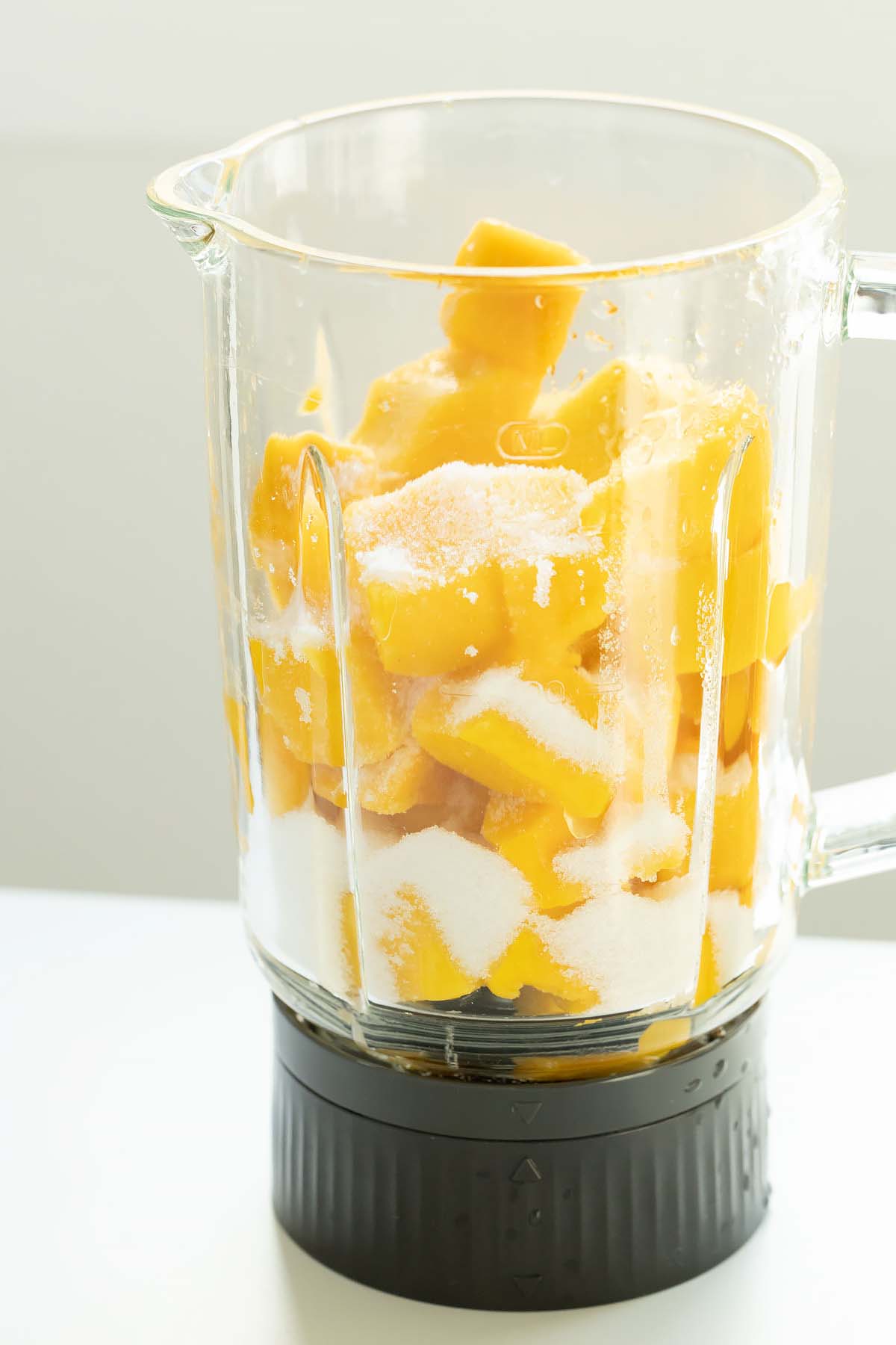 Ingredients for mango sorbet in the blender