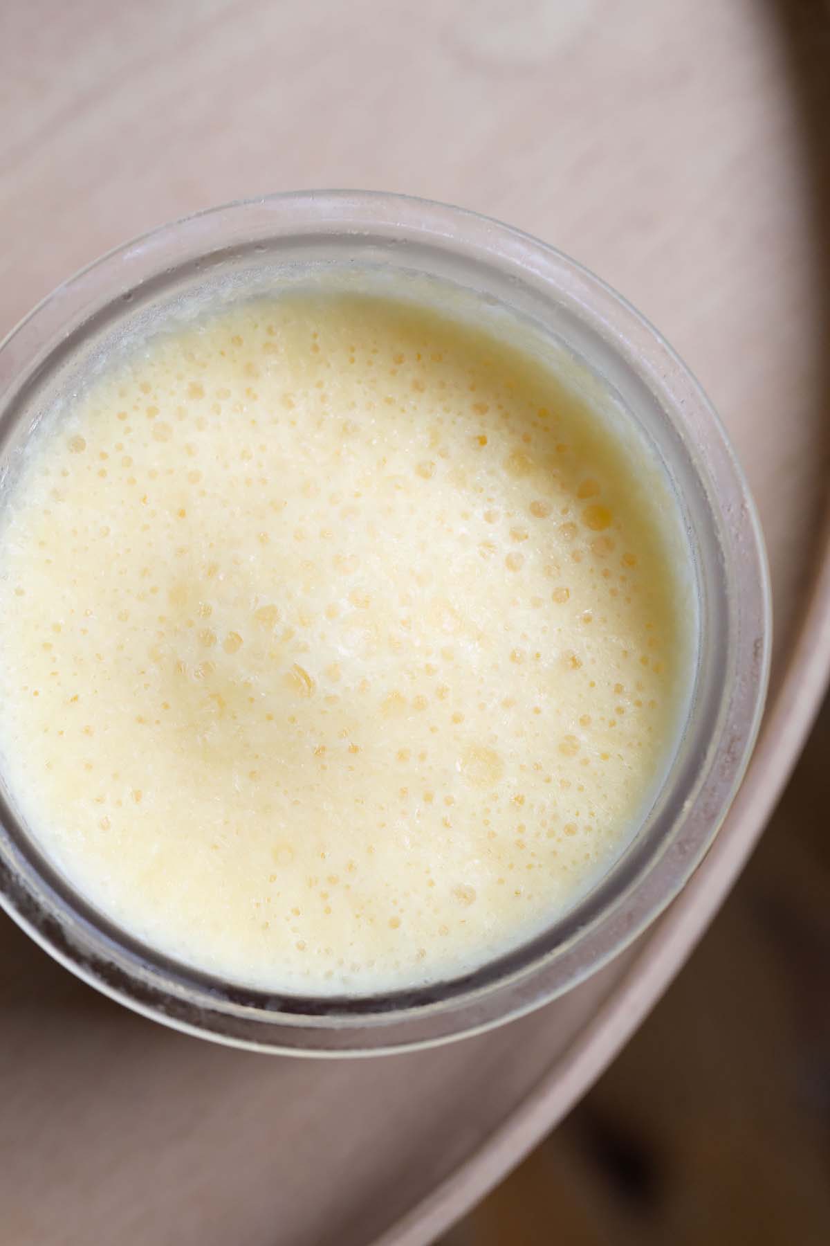 Frozen ice cream in Ninja Creami pint