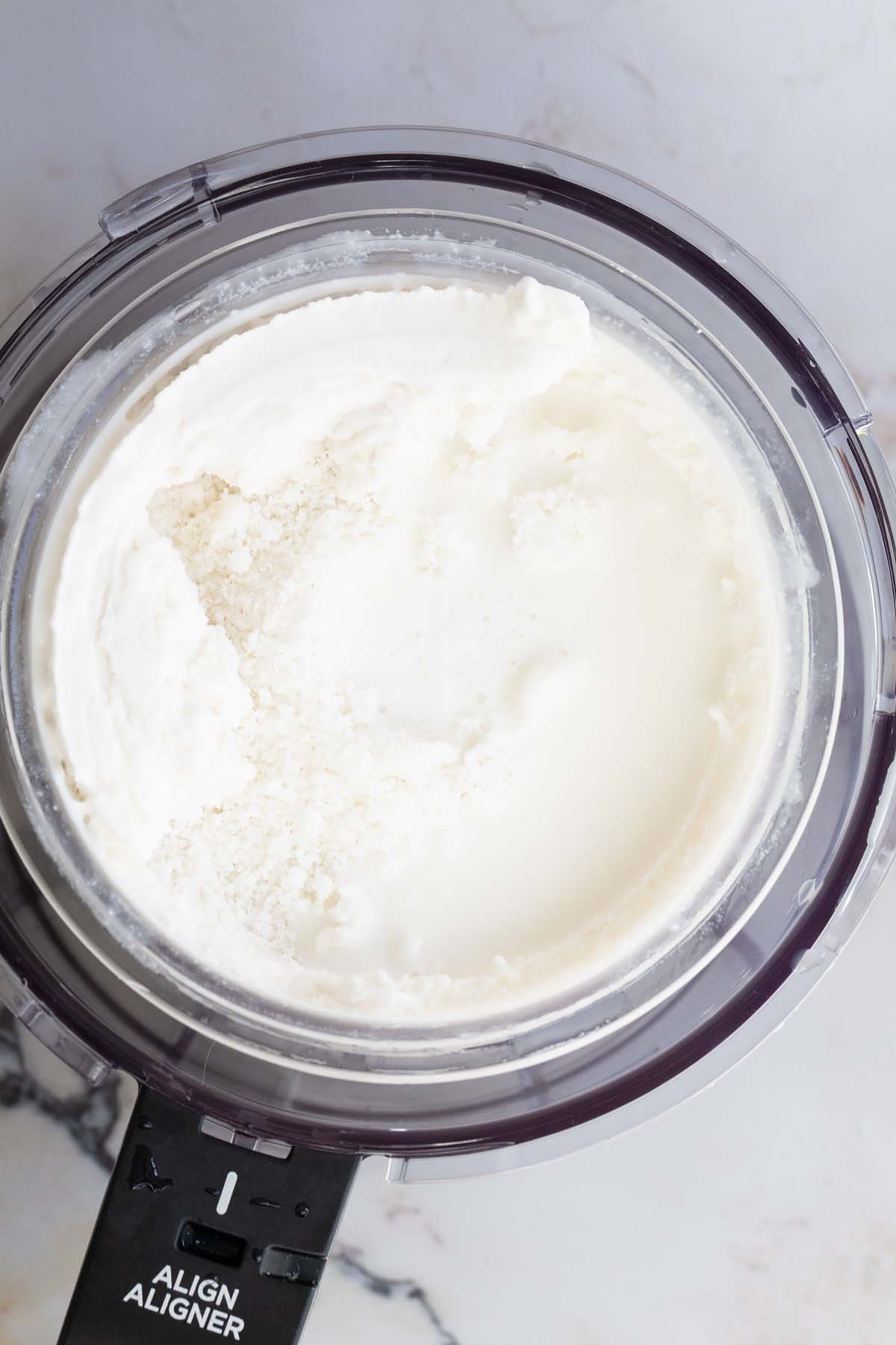 Adding milk to processed coconut ice cream