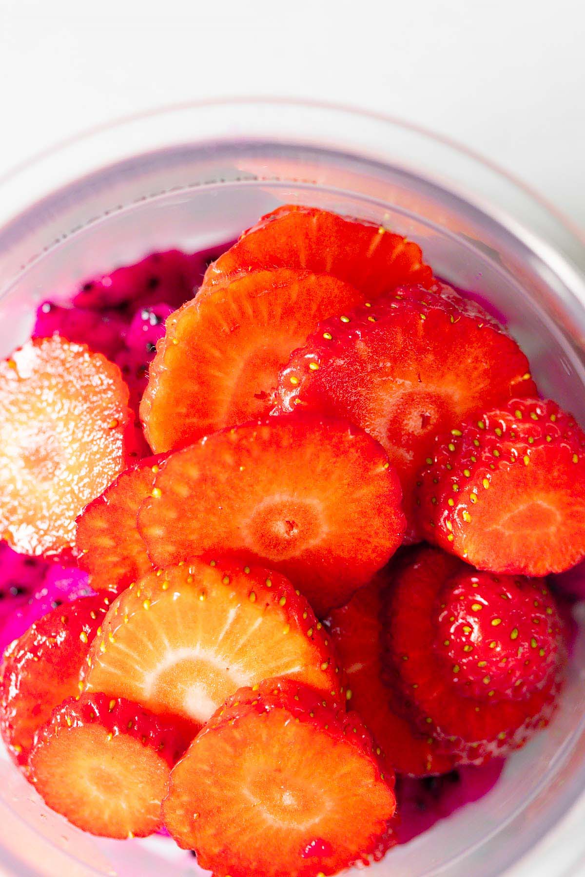 Sliced strawberries in Ninja Creami container