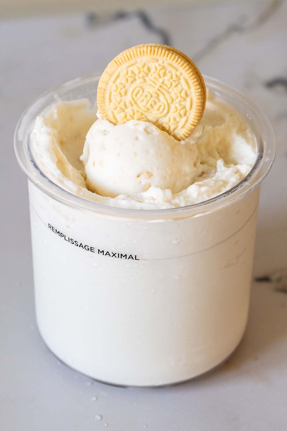 Golden Oreo Ninja Creami with an Oreo topping it.