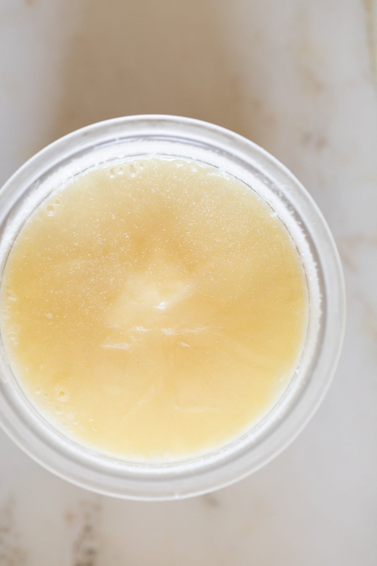 Frozen ice cream in Ninja Creami pint