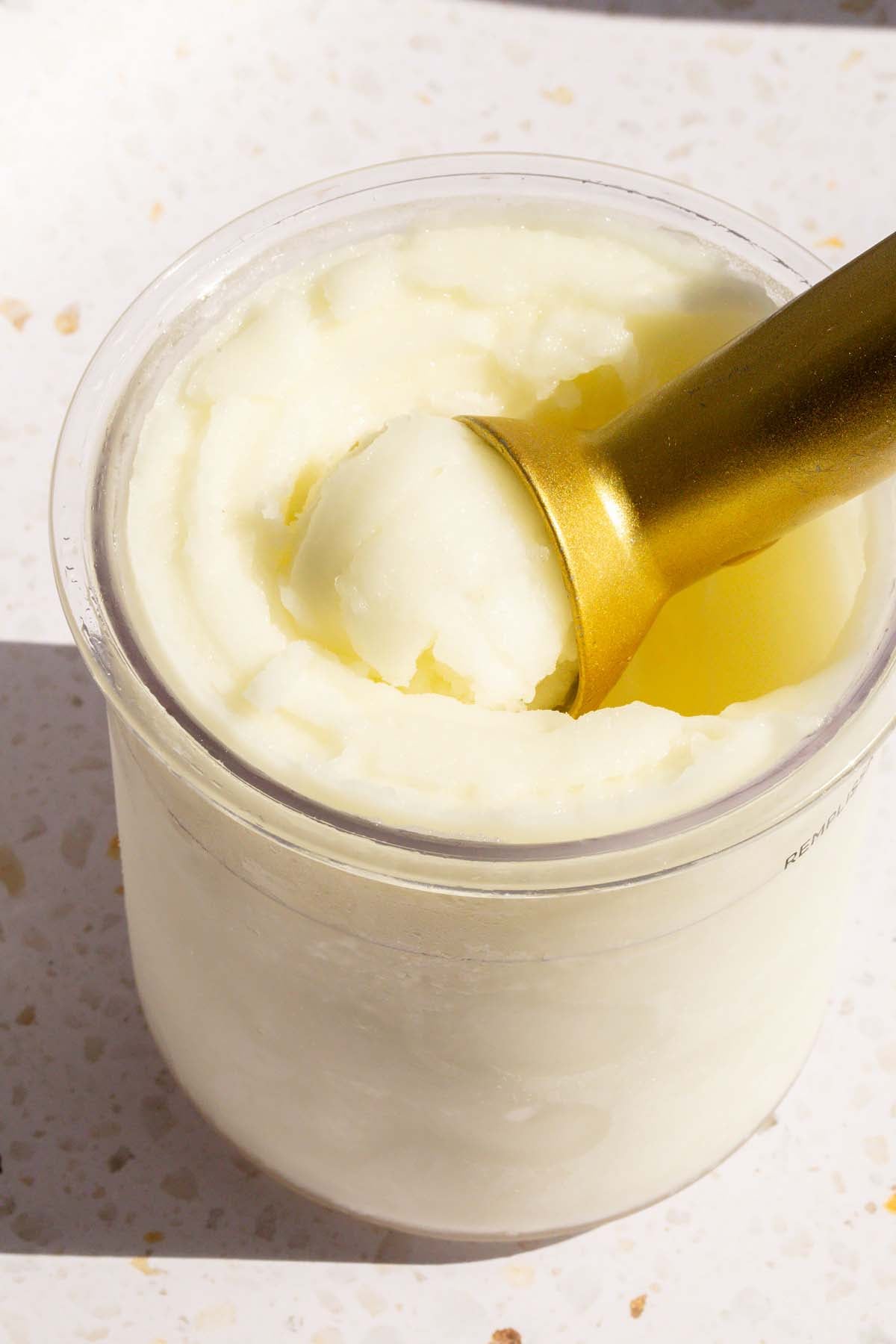 Ninja Creami lime sorbet with an ice cream scoop