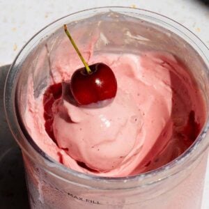 Ninja Creami cherry ice cream with a cherry on top