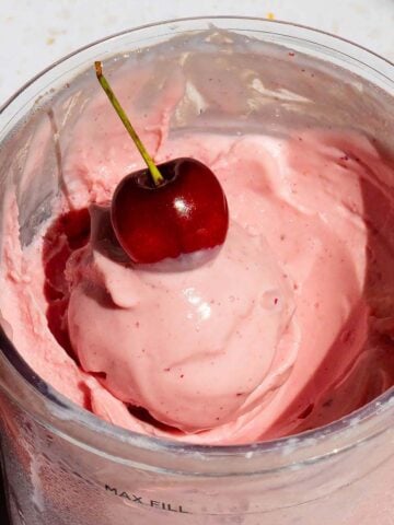 Ninja Creami cherry ice cream with a cherry on top