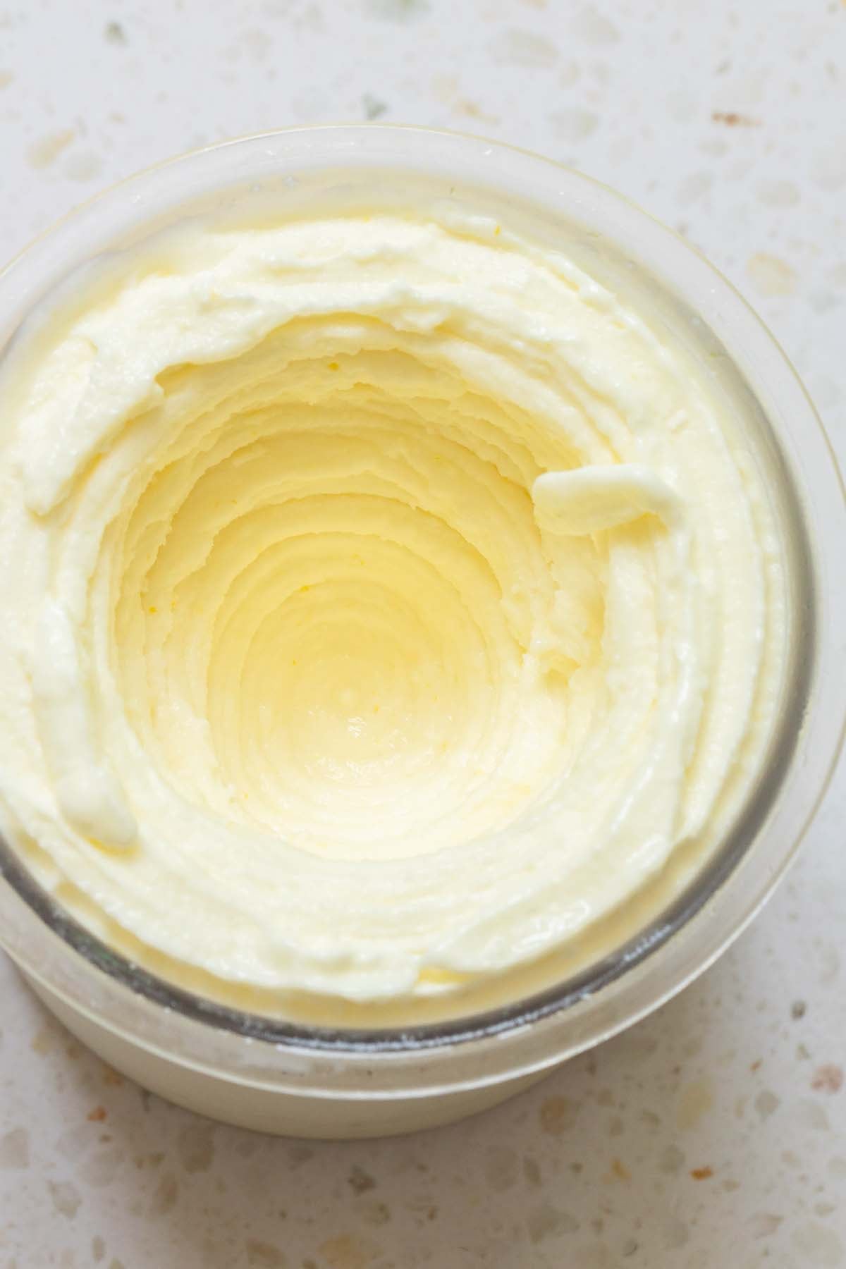 Ninja Creami lemon frozen yogurt processed in Ninja Creami pint