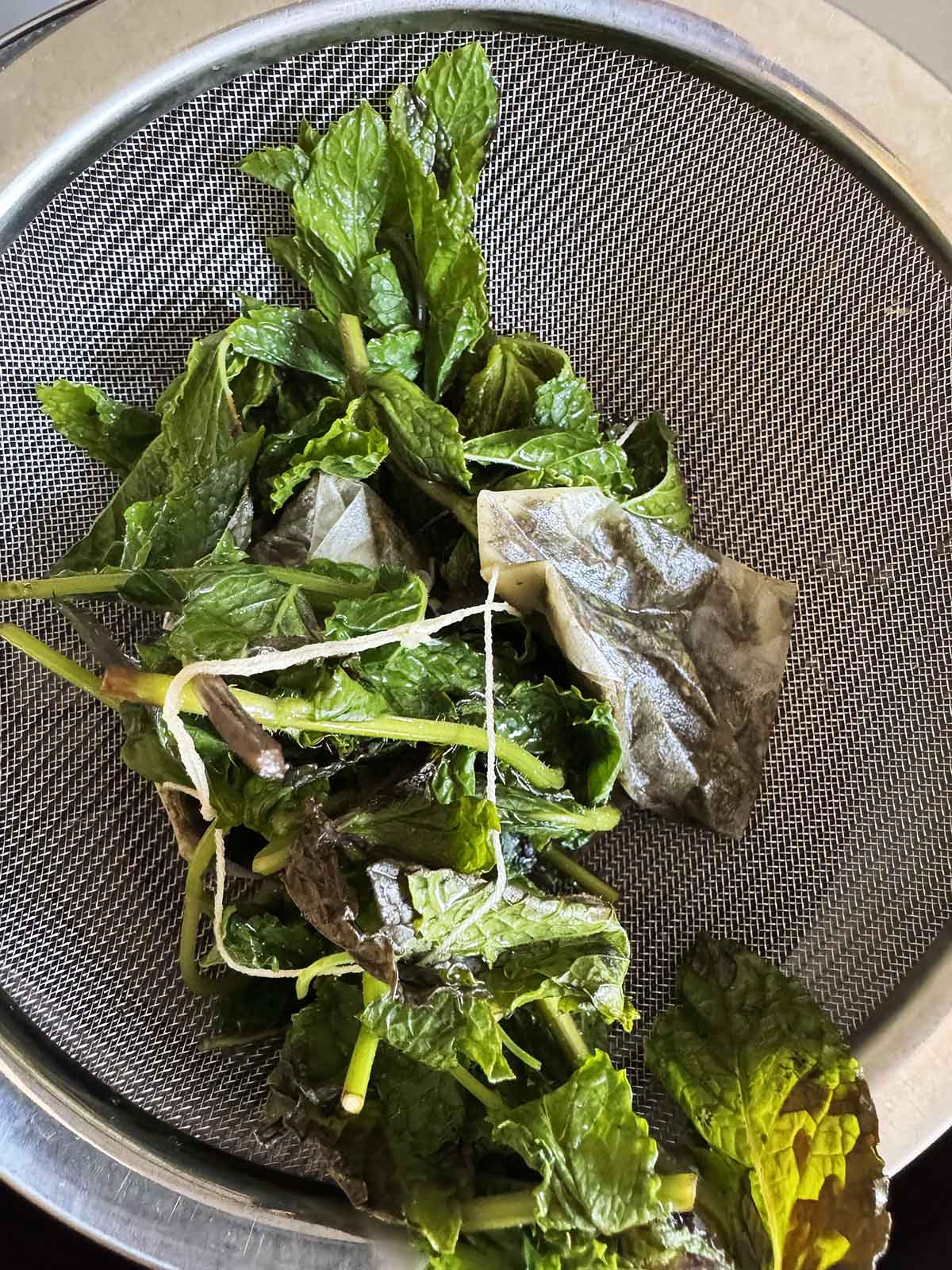 Straining mint and tea