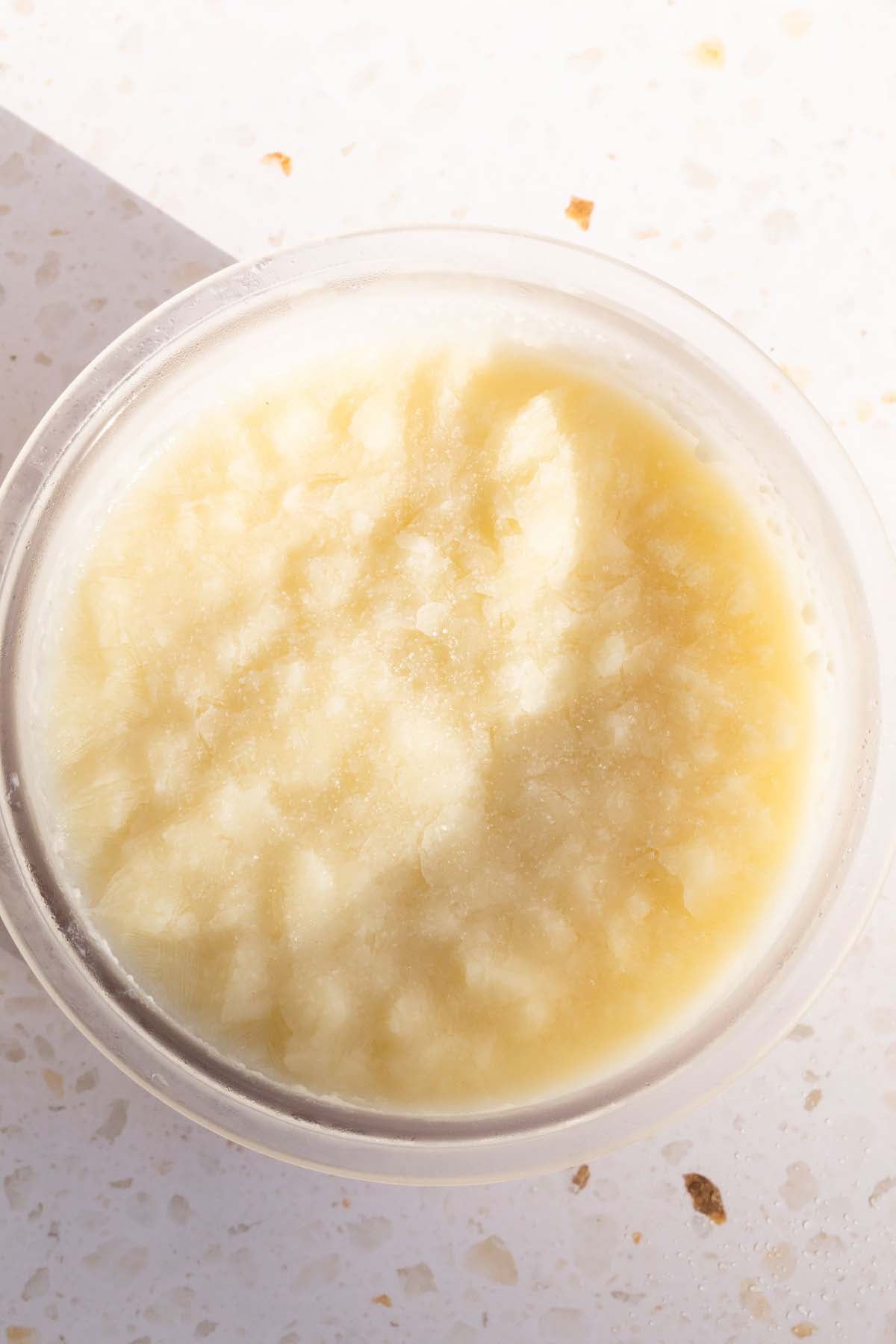 Frozen ice cream in Ninja Creami container