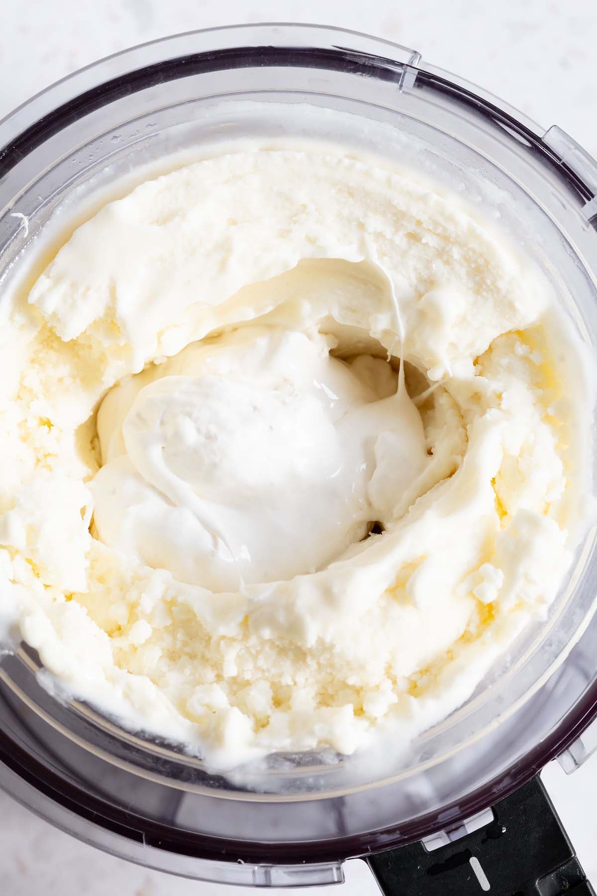 Adding marshmallow fluff to ice cream