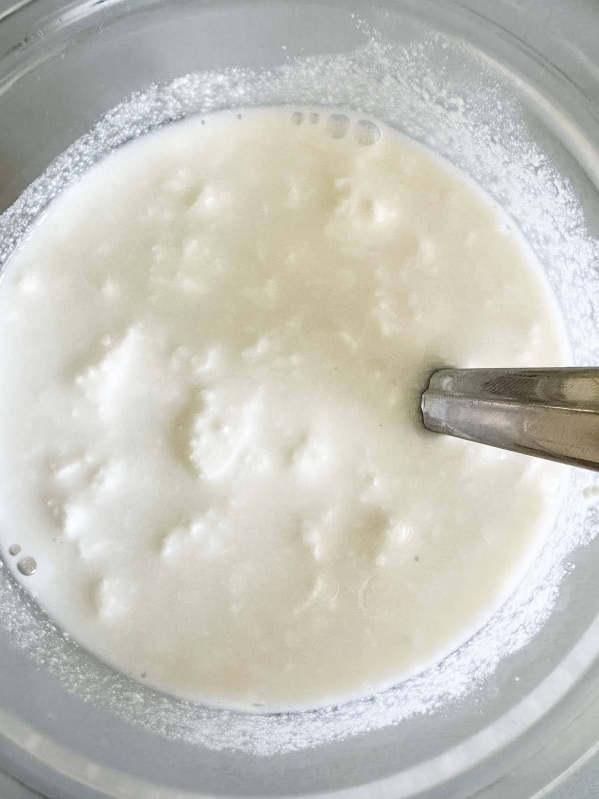 Ingredients mixed together in Ninja Creami container