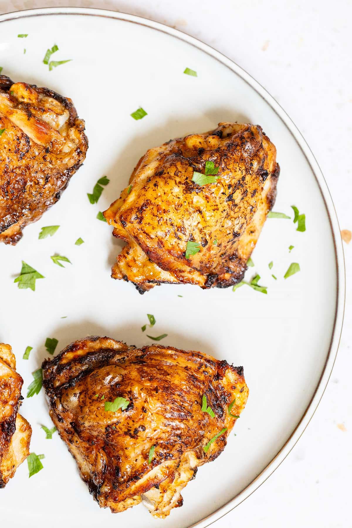 Ninja Crispi chicken thighs on a plate
