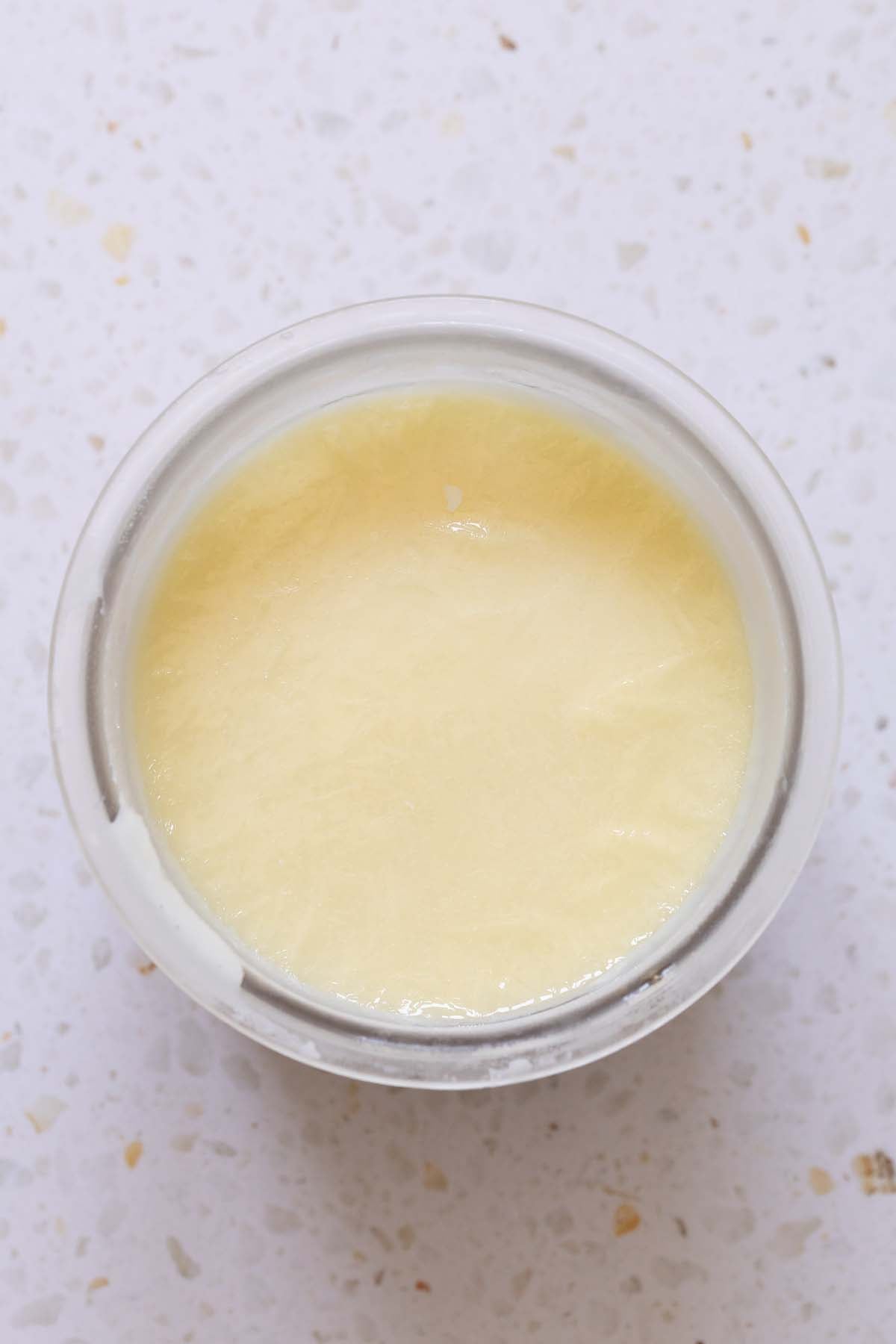 Frozen ice cream in Ninja Creami container