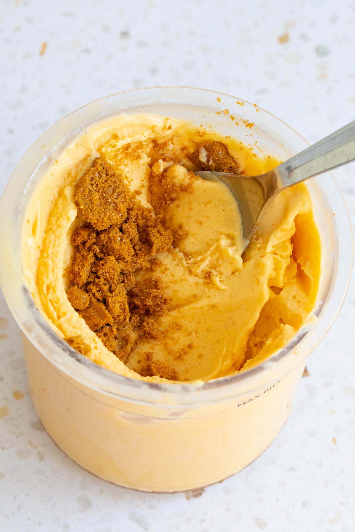Ninja Creami pumpkin cheesecake ice cream with a spoon